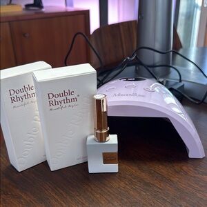 Double rhythm nail polish with UV lamp.